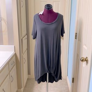 Grey easel dress with accent on the hem